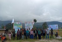 Logo HAM dan YKKMP dipasang berdampingan dengan baliho kemanusiaan di Distrik Sinak, Kabupaten Puncak. Dok_Istimewa.NT