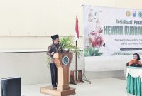 Sekda Kab. Nabire, Yulianus Pasang saat membacakan sambutan Bupati Mesak di sosialisasi penanganan hewan kurban 1447 H. di Aula Islamic Center jalan merdeka. Sabtu (23/5/2026). Dok-Alvi