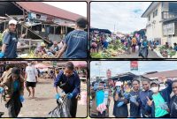 Relawan dari PTS Nabire, Komda Papua Tengah, dan Kewita membersihkan sampah di kawasan Pasar Karang Tumaritis, Nabire, Sabtu (6/6/2026). Aksi tersebut digelar dalam rangka memperingati Hari Lingkungan Hidup Sedunia sekaligus mengajak masyarakat meningkatkan kepedulian terhadap kebersihan lingkungan. Dok_ Alvi. NT