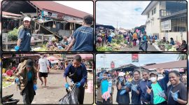 Relawan dari PTS Nabire, Komda Papua Tengah, dan Kewita membersihkan sampah di kawasan Pasar Karang Tumaritis, Nabire, Sabtu (6/6/2026). Aksi tersebut digelar dalam rangka memperingati Hari Lingkungan Hidup Sedunia sekaligus mengajak masyarakat meningkatkan kepedulian terhadap kebersihan lingkungan. Dok_ Alvi. NT