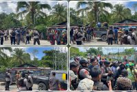 Personel Polres Nabire bersama tokoh masyarakat dan pemerintah kampung memfasilitasi mediasi terkait aksi pemalangan Jalan Trans Nabire–Paniai di Kampung Gerbang Sadu, Selasa (9/6/2026). Mediasi menghasilkan kesepakatan damai dan arus lalu lintas kembali normal. Dok_Ist. NT
