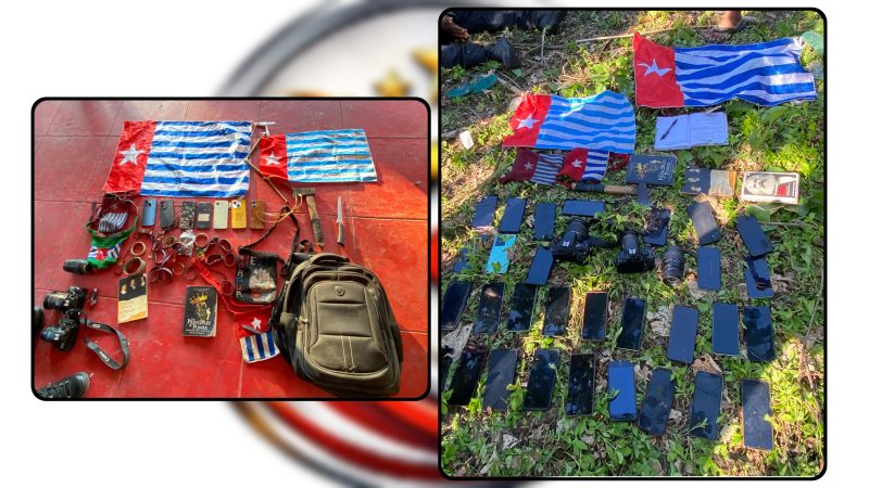 Petugas Polres Nabire mengamankan sejumlah pelajar dan barang bukti terkait dugaan pengibaran bendera bercorak Bintang Kejora di Kampung Waroki, Distrik Nabire Barat, Sabtu (25/7/2026). Polisi masih melakukan penyelidikan. Dok_Res. NT