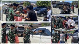Prajurit Yonif TP 804/DBAY membagikan paket makanan kepada jemaah usai Salat Jumat di Masjid Agung Al-Falah, Nabire, sebagai wujud kepedulian sosial dan upaya mempererat kemanunggalan TNI dengan masyarakat, Jumat (31/7/2026). Dok_YonTP. NT