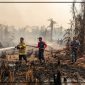 Personel Lanal Nabire bersama unsur terkait dan masyarakat melakukan pemadaman kebakaran lahan di Kampung Samabusa, Distrik Teluk Kimi, Nabire, Sabtu (12/9/2026). Dok_Lanal Nabire