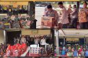 Kapolres Nabire AKBP Samuel Dominggus Tatiratu menyerahkan bantuan bahan makanan kepada masyarakat Suku Dani asal Kabupaten Puncak Jaya di Nabire, Rabu (30/9/2026). Dok_HPN